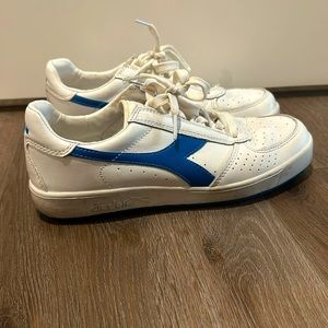White and blue sneakers, womens size 7 from Diadora brand.